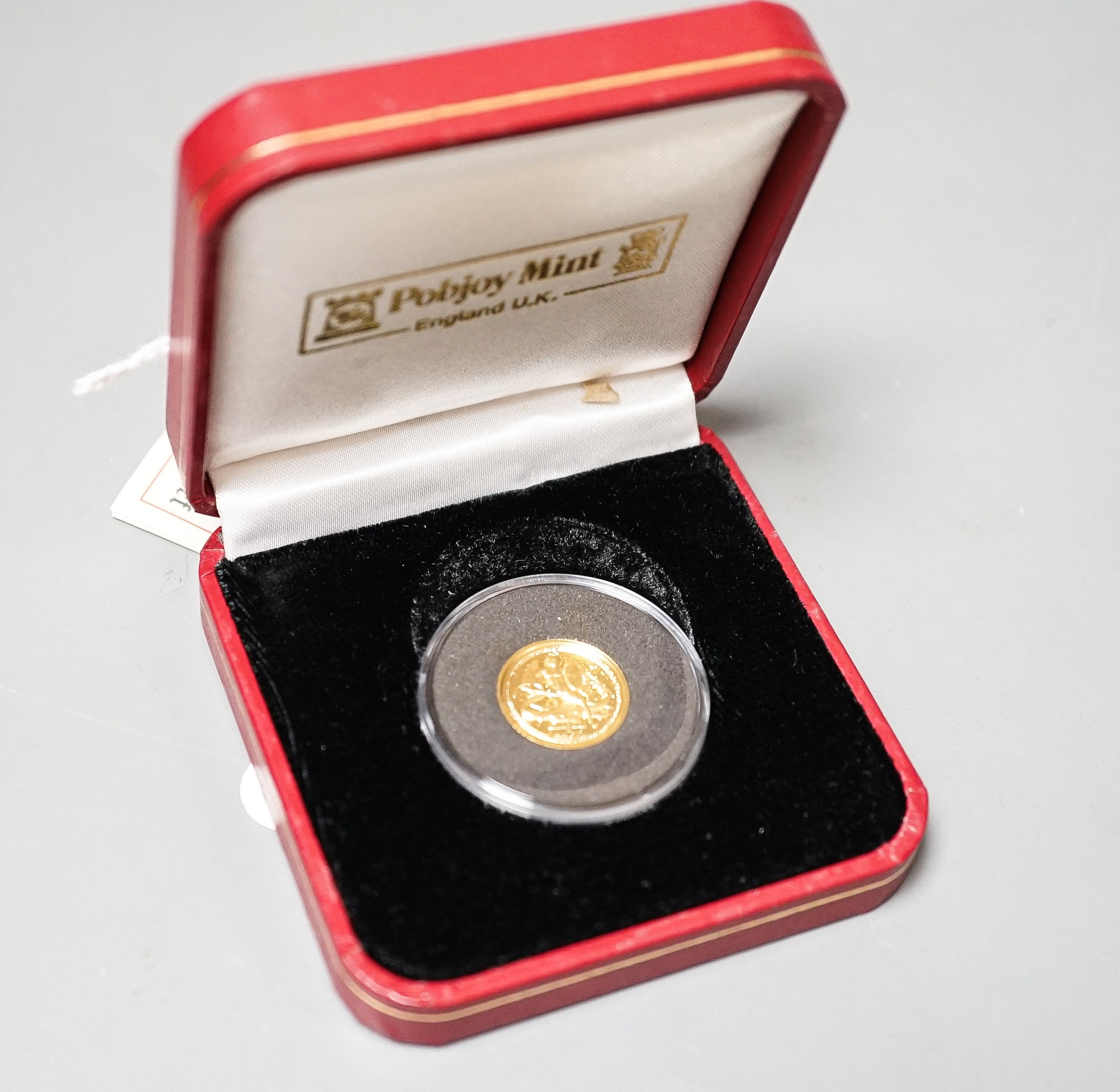 A Pobjoy mint gold 1/10 oz. piedfort British Angel, cased with certificate
